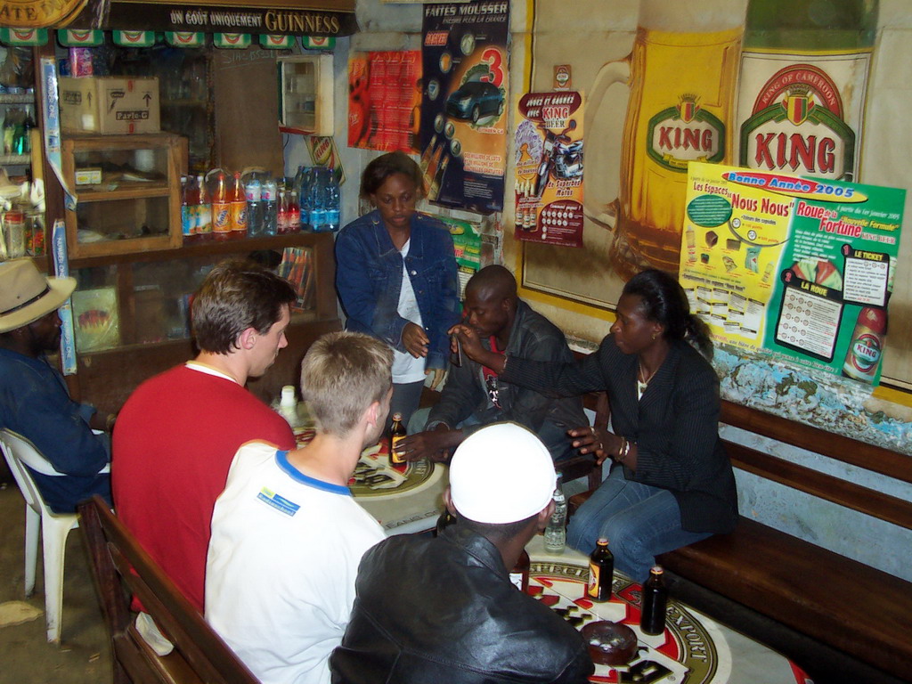 Tim and his friends at a bar along the road from Douala