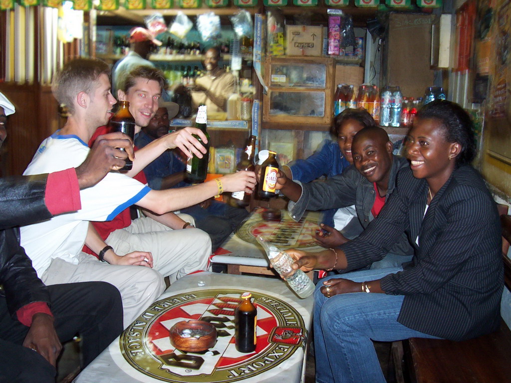 Tim and his friends at a bar along the road from Douala