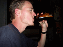 Tim`s friend at a bar along the road from Douala