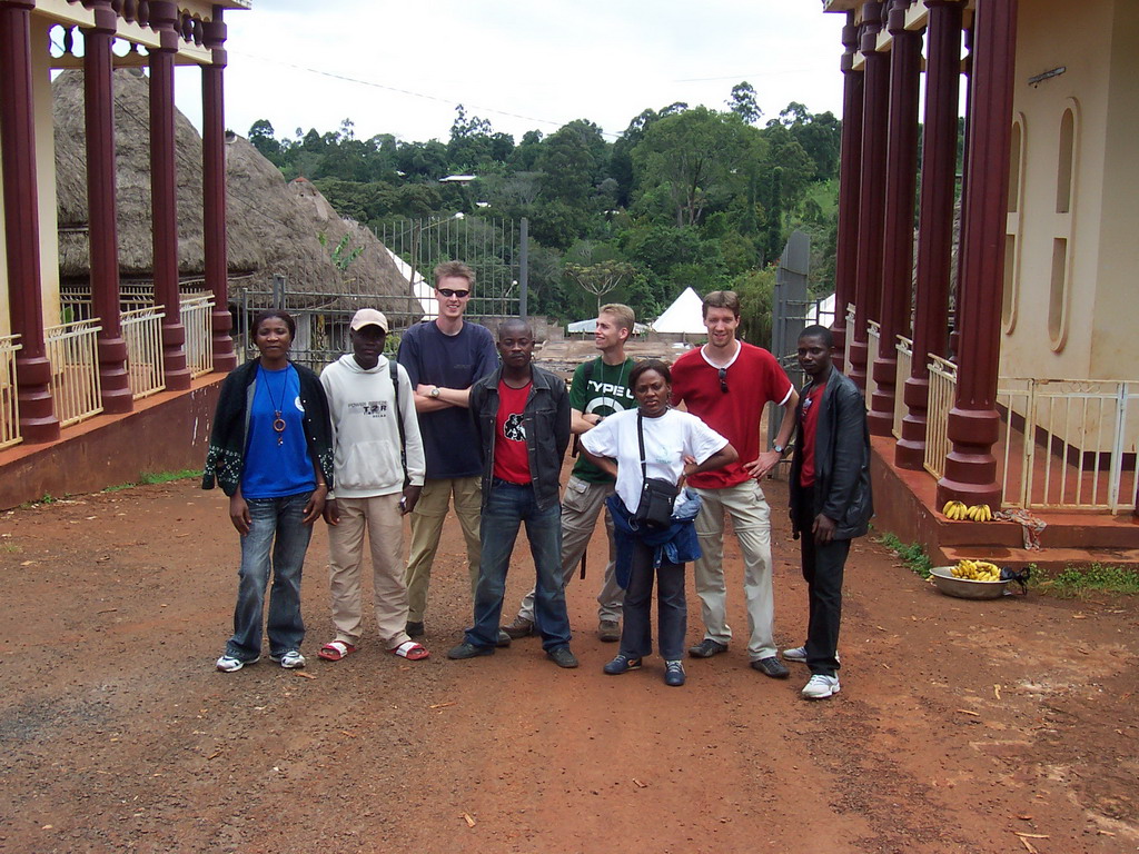 Tim and his friends in front of the Bandjoun Palace