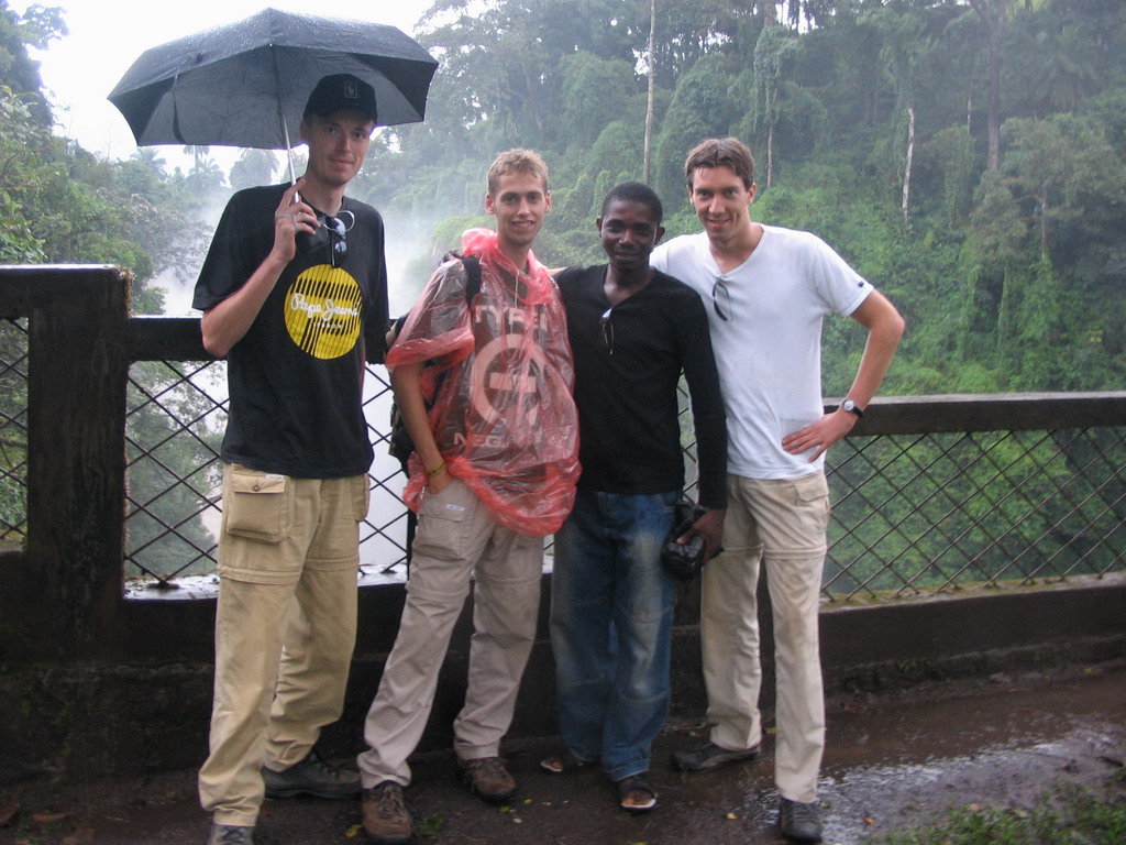 Tim and his friends in front of the Menchum Waterfall
