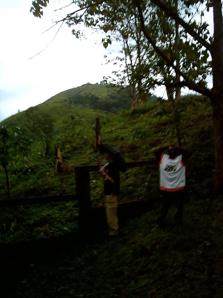 Tim`s friends next to the road from the Menchum Waterfall