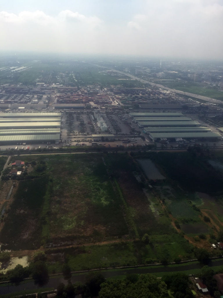 Rom Klao Transportation airport cargo containers just north of Bangkok Suvarnabhumi Airport, viewed from the airplane from Haikou