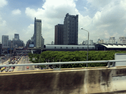 The Asok-Din Daeng Road, the Makkasan Railway Station and skyscrapers in the city center, viewed from the taxi on the Sirat Expressway