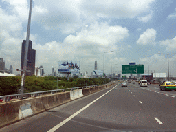 The Sirat Expressway, the Baiyoke Tower II and other skyscrapers in the city center, viewed from the taxi