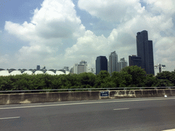 The Makkasan Railway Station and skyscrapers in the city center, viewed from the taxi on the Sirat Expressway