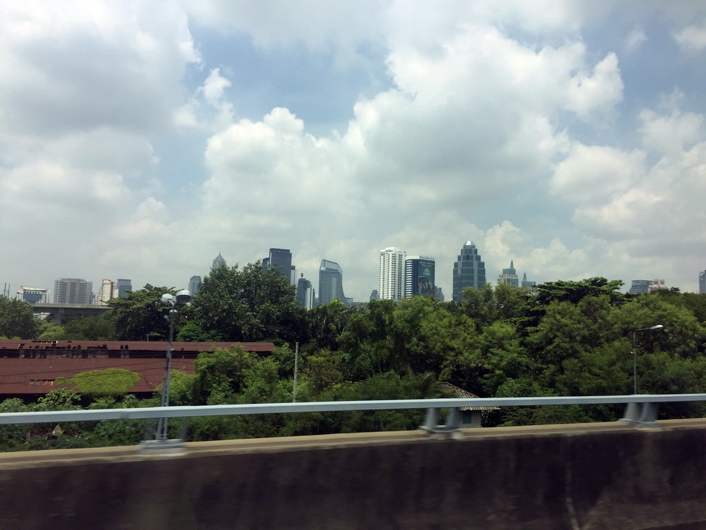 Skyscrapers in the city center, viewed from the taxi on the Sirat Expressway