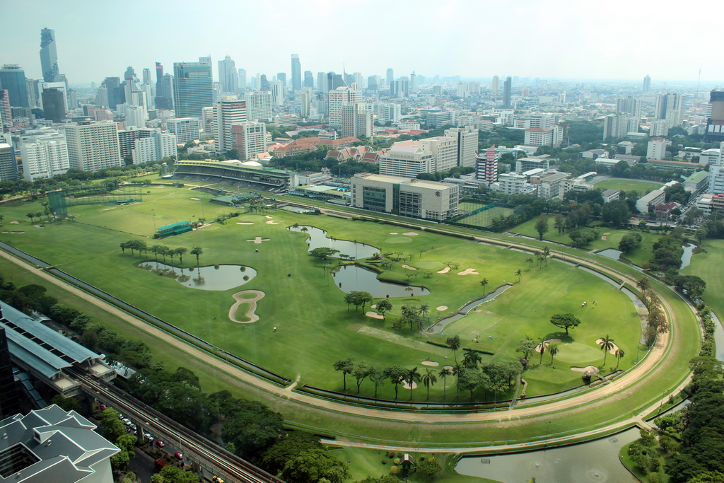 The Royal Bangkok Sports Club golf course, Chulalongkorn University, the MahaNakhon building, the State Tower, the Bangkok River Park Condominium and other skyscrapers in the city center, viewed from our room at the Grande Centre Point Hotel Ratchadamri Bangkok