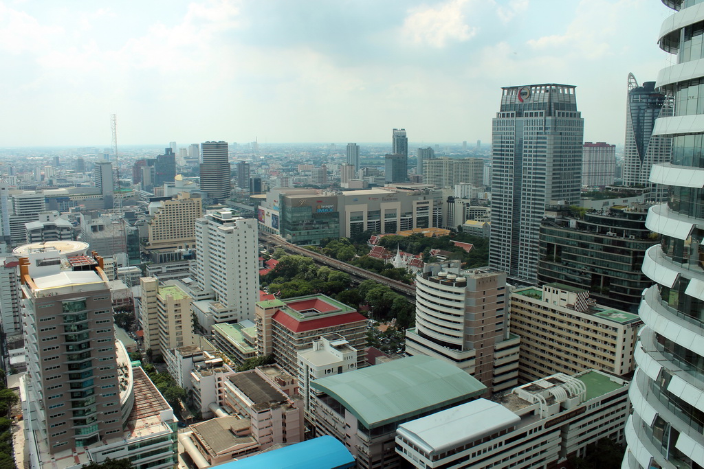 The Siam Paragon shopping mall, the Wat Pathumwanaram Ratchaworawihan temple, the Central World Tower, the Centara Grand & Bangkok Convention Centre and other skyscrapers in the Central Business District, viewed from our room at the Grande Centre Point Hotel Ratchadamri Bangkok