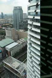 The Magnolias Ratchadamri Boulevard building, the Wat Pathumwanaram Ratchaworawihan temple, the Central World Tower, the Centara Grand & Bangkok Convention Centre and other skyscrapers in the Central Business District, viewed from our room at the Grande Centre Point Hotel Ratchadamri Bangkok