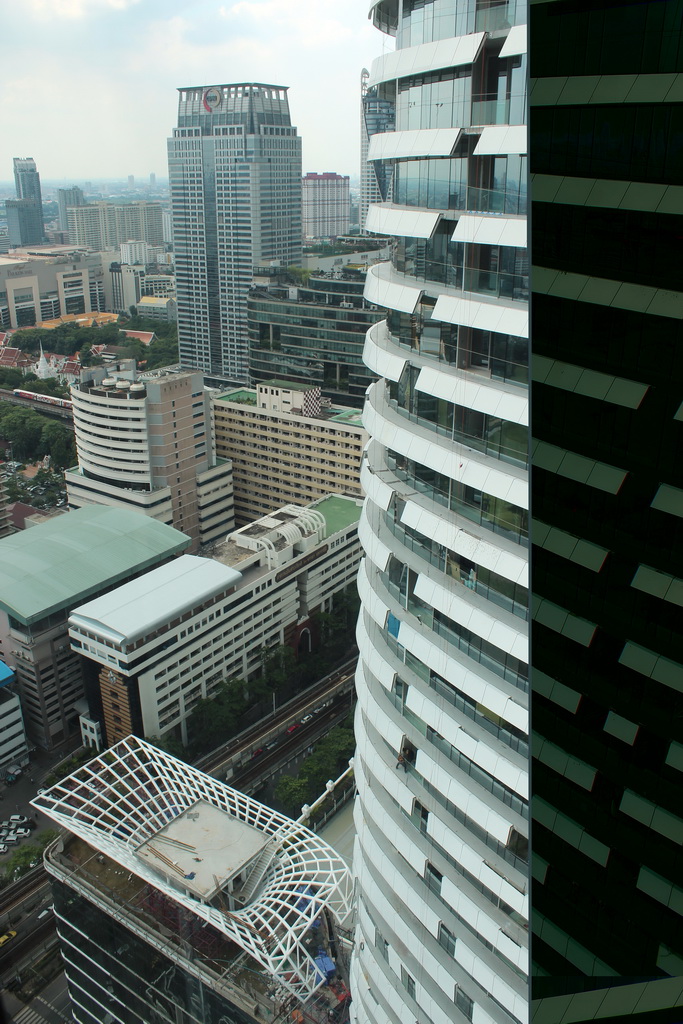 The Magnolias Ratchadamri Boulevard building, the Wat Pathumwanaram Ratchaworawihan temple, the Central World Tower, the Centara Grand & Bangkok Convention Centre and other skyscrapers in the Central Business District, viewed from our room at the Grande Centre Point Hotel Ratchadamri Bangkok