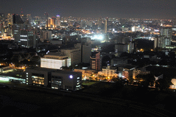 Chulalongkorn University and skyscrapers in the city center, viewed from our room at the Grande Centre Point Hotel Ratchadamri Bangkok, by night