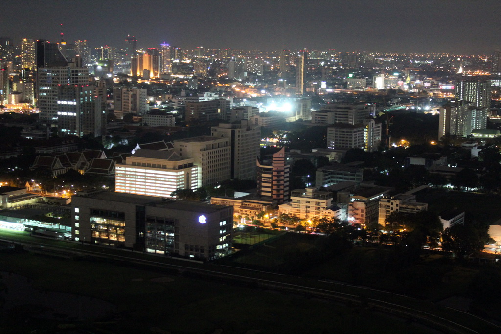 Chulalongkorn University and skyscrapers in the city center, viewed from our room at the Grande Centre Point Hotel Ratchadamri Bangkok, by night