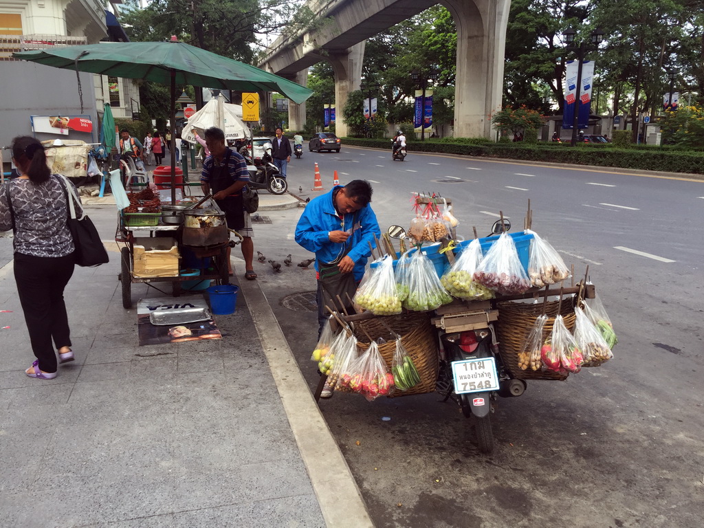 Streetfood stall and scooter at Ratchadamri Road