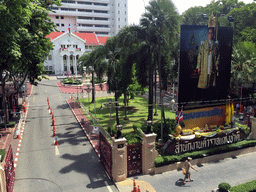 Front of the Royal Thai Police Headquarters at Rama I Road with a portrait of King Rama IX, viewed from the skywalk