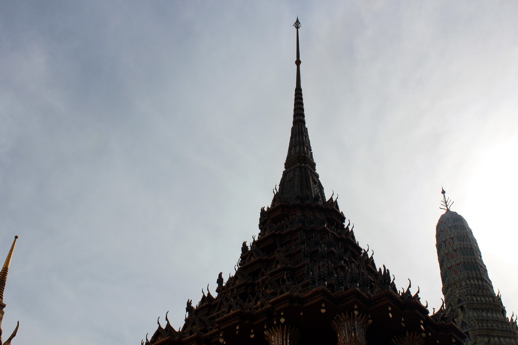 Top parts of the Phra Mondop hall and the Prasat Phra Dhepbidorn hall at the Temple of the Emerald Buddha at the Grand Palace