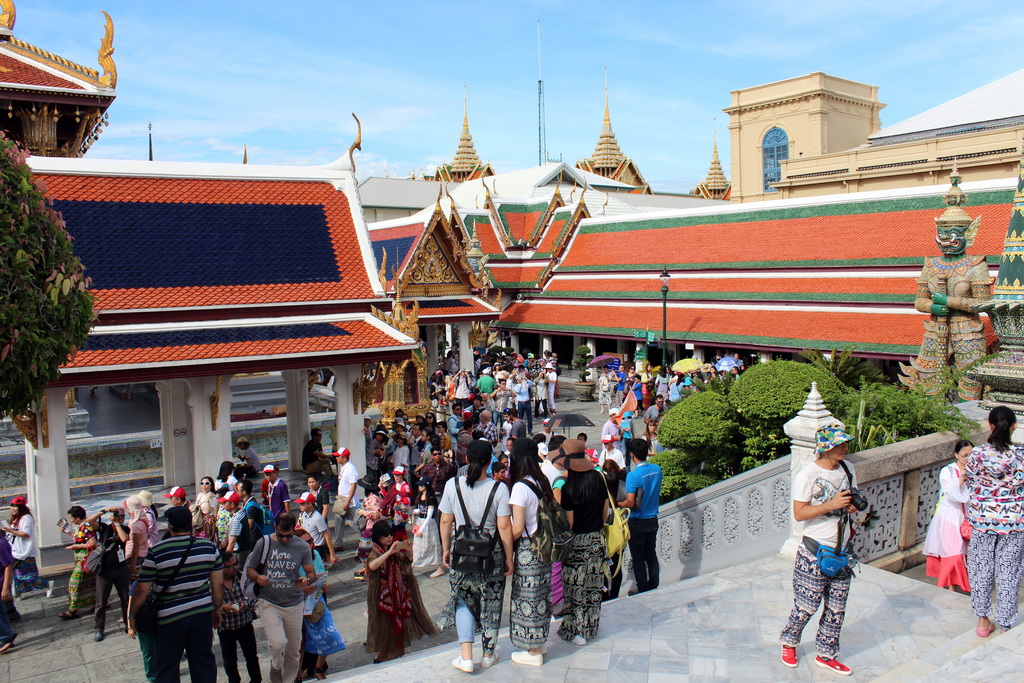 The Hor Phra Rajphongsanusorn hall, a pavilion at the northwest side of the Chapel of the Emerald Buddha and a Yaksha statue at the Temple of the Emerald Buddha at the Grand Palace