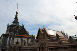 The Phra Wiharn Yod hall and the Hor Phra Naga hall at the Temple of the Emerald Buddha at the Grand Palace