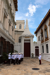 Guards in front of the right entrance gate to the Chakri Maha Prasat hall at the Grand Palace