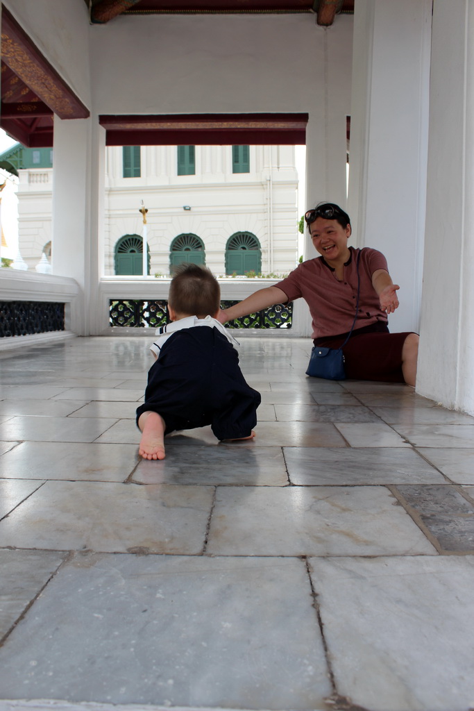 Miaomiao and Max at a gallery in front of the Dusit Maha Prasat hall at the Grand Palace