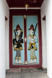 Carved doors at the Museum of the Emerald Buddha Temple at the Grand Palace
