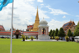 Statue at the Outer Court, the Phra Siratana Chedi stupa, the Prasat Phra Dhepbidorn hall and the Chapel of the Emerald Buddha at the Temple of the Emerald Buddha at the Grand Palace