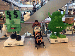 Miaomiao and Max with statues created by Jeremyville at the Central World shopping mall