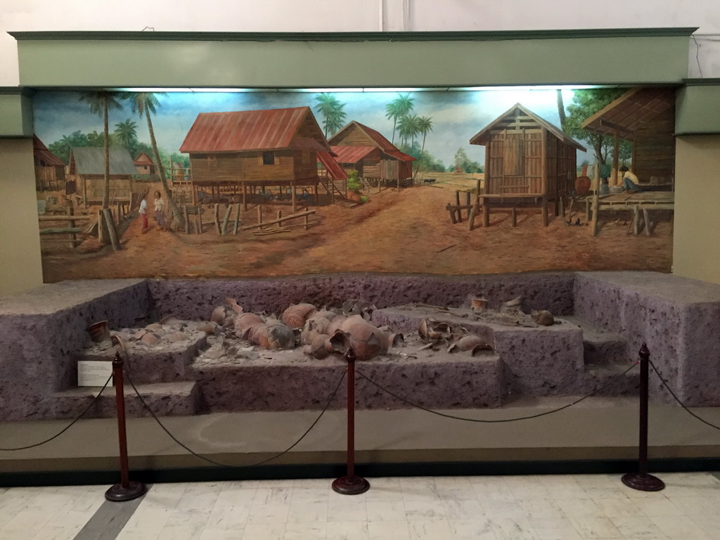 Model and painting of the Ban Chiang Excavation Site, at the Prehistory room at the First Floor of the Maha Surasinghanat Building at the Bangkok National Museum