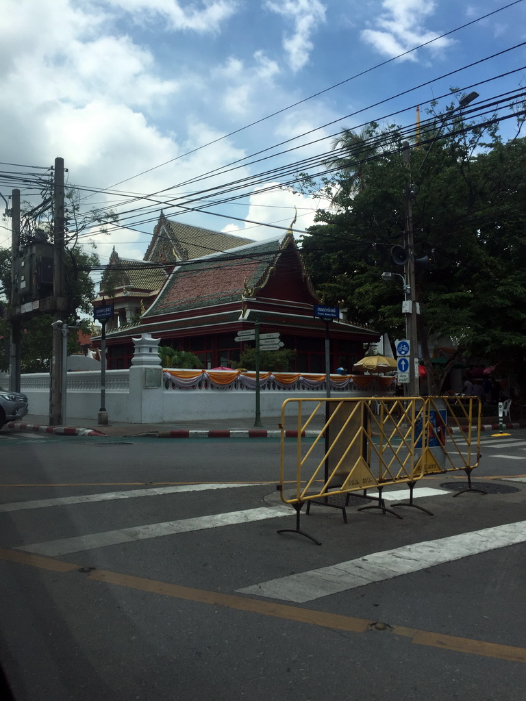 North side of the Wat Bowonniwet Vihara Rajavaravihara temple complex at Phra Sumen Road, viewed from the taxi