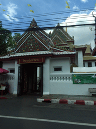 Gate at the northeast side of the Wat Bowonniwet Vihara Rajavaravihara temple complex at Phra Sumen Road, viewed from the taxi