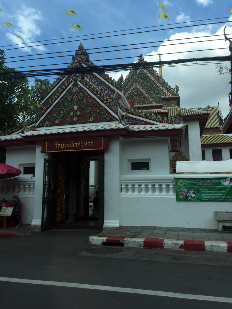 Gate at the northeast side of the Wat Bowonniwet Vihara Rajavaravihara temple complex at Phra Sumen Road, viewed from the taxi