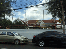 Northeast side of the Wat Bowonniwet Vihara Rajavaravihara temple complex at Phra Sumen Road, viewed from the taxi