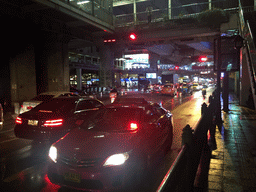 Cars and skywalk at Rama I Road, by night