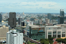 The Siam Paragon shopping mall, the Wat Pathumwanaram Ratchaworawihan temple, the United Nations ESCAP building and skyscrapers in the Central Business District, viewed from our room at the Grande Centre Point Hotel Ratchadamri Bangkok