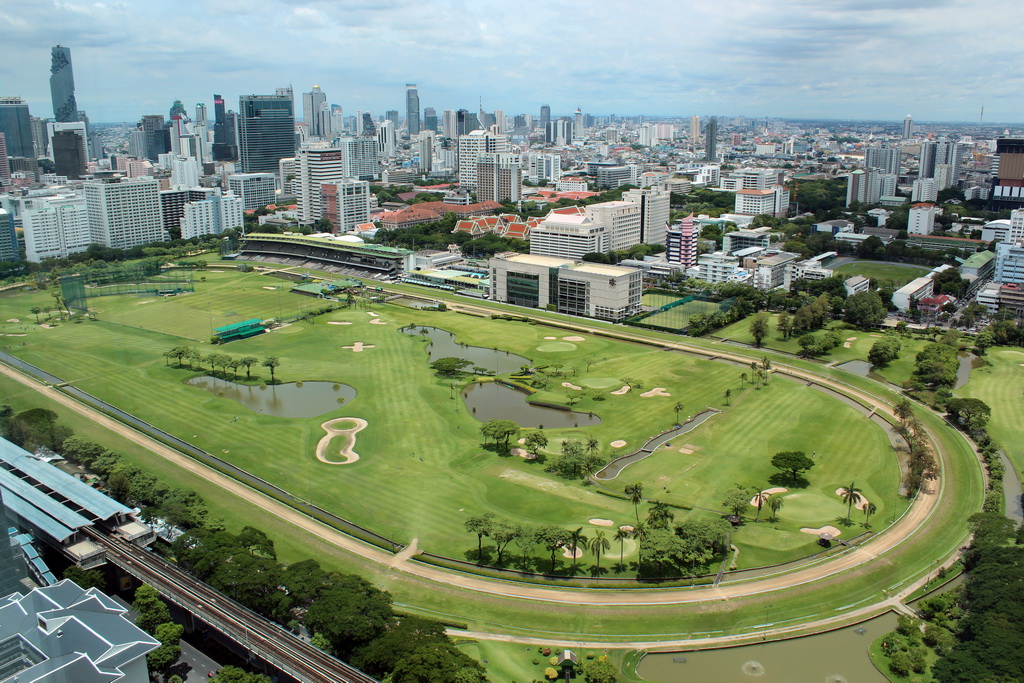 The Royal Bangkok Sports Club golf course, Chulalongkorn University, the MaHaNakhon building, the State Tower, the Bangkok River Park Condominium and other skyscrapers in the city center, viewed from our room at the Grande Centre Point Hotel Ratchadamri Bangkok