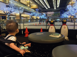 Max in front of the ice rink at the Central World shopping mall