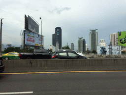 The Chalerm Maha Nakhon Expressway and skyscrapers in the city center, viewed from the taxi