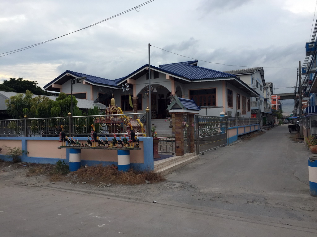 House with altar at Prachathon Alley in the Lat Krabang district