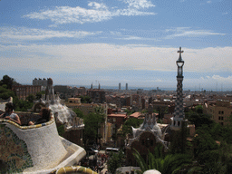 View from Park Güell on the tower of the entrance building, the city center and the towers of the Sagrada Família church