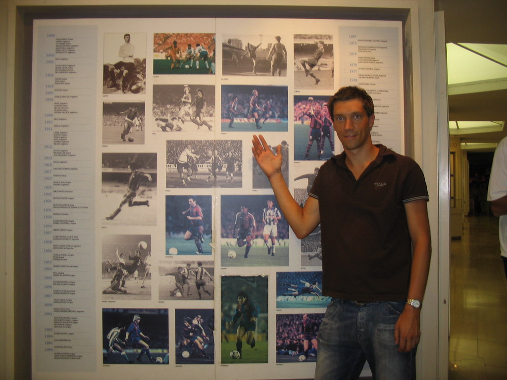 Tim with a poster of former players, in the FC Barcelona Museum of the Camp Nou stadium