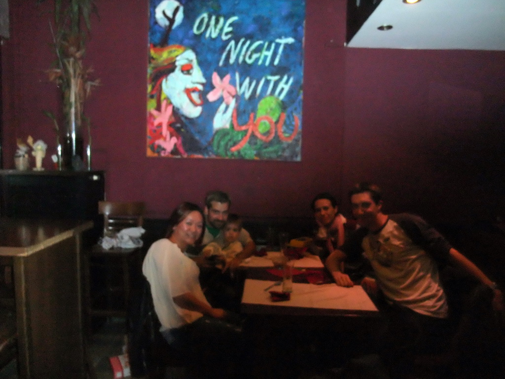 Toni with wife and child, Tim and Miaomiao in a tapas bar at the Carrer de Ramon Turró street