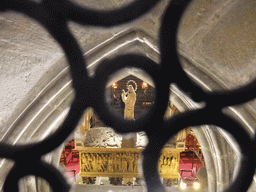 The back side of the tomb of Santa Eulalia, viewed through a gate, in the Cathedral of Santa Eulalia