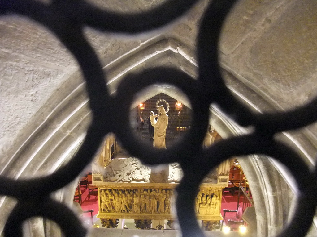 The back side of the tomb of Santa Eulalia, viewed through a gate, in the Cathedral of Santa Eulalia