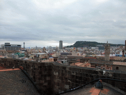 The roof of the Cathedral of Santa Eulalia with a view on the region to the south, with the Edificio Colón building, the Montjüic hill and the Torre Jaume I tower