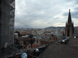 The roof and one of the towers of the Cathedral of Santa Eulalia, with a view on the region to the west