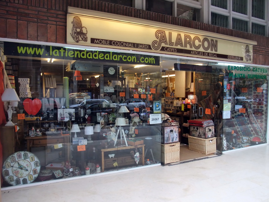 Front of the `La Tienda de Alarcon` shop in the Carrer de Provença street