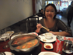 Miaomiao having fondue at the `L`Olla de Sichuan` restaurant at the Carrer d`Aragó street