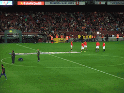 Players doing the warm-up just before the football match FC Barcelona - Sevilla FC in the Camp Nou stadium