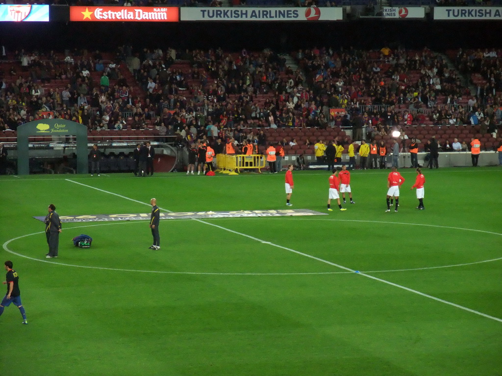 Players doing the warm-up just before the football match FC Barcelona - Sevilla FC in the Camp Nou stadium
