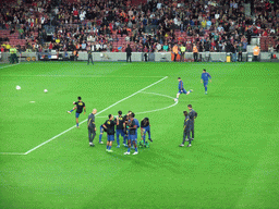 Players doing the warm-up just before the football match FC Barcelona - Sevilla FC in the Camp Nou stadium